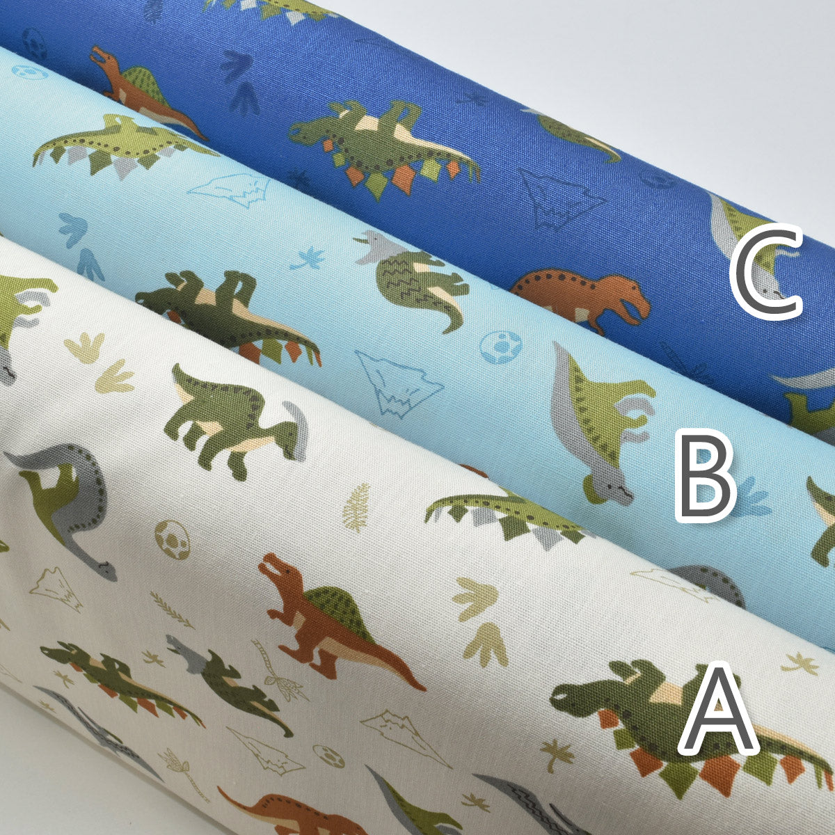 かわいい恐竜柄ポプリン生地H7105-11菱栄(30cm以上10cm単位切り売り)