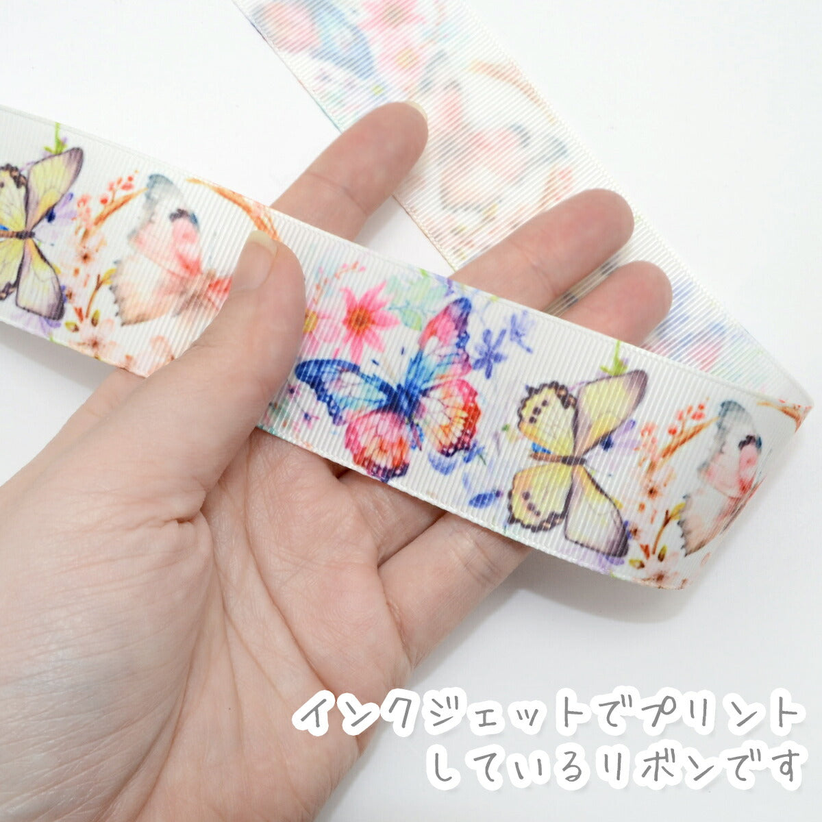 プリントリボン優美な蝶々リボン幅38mm1m単位切り売り(2m以上)「在庫限り」