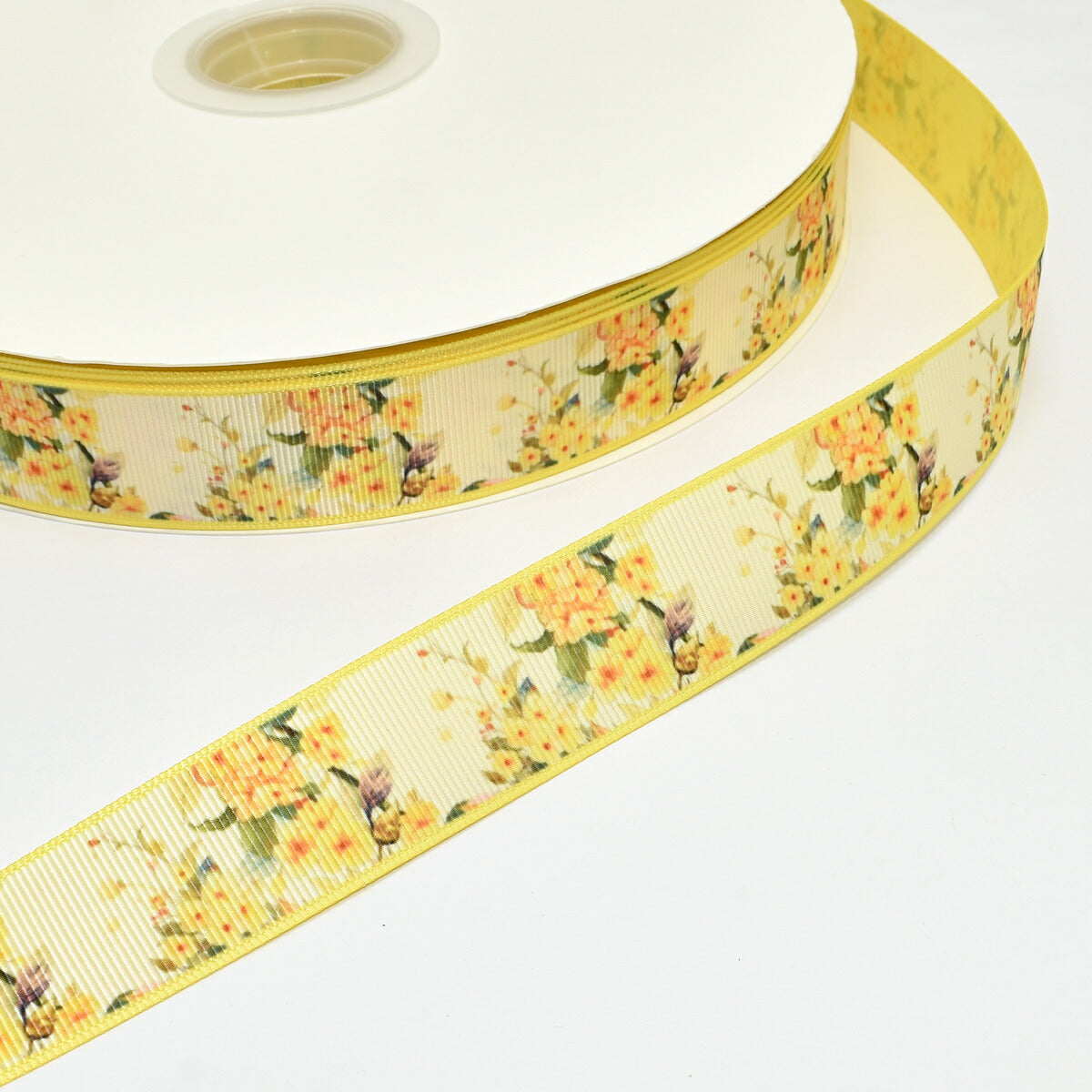 両面プリントリボン優々たる黄色い花柄リボン幅25mm1m単位切り売り(2m以上)「在庫限り」