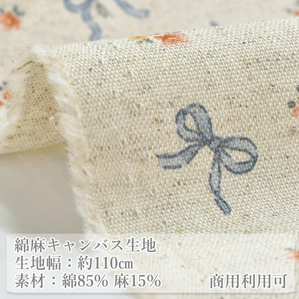 リボンと小花綿麻キャンバス生地AP65203-3コスモ(30cm以上10cm単位切り売り)